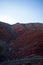 Red sandstone outcrops on the slopes of Big Bogdo sacred mountain in Caspian steppe Bogdo-Baskunchak nature reserve, Astrakhan