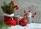 Red Santa`s boot,fir tree,gift,snowman figurine and Christmas ball on wooden background.Christmas background.