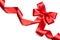 Red satin gift bow. Red ribbon isolated on white