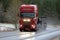 Red Scania R560 Truck High Beams on Winter Road