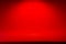 Red scene with spot of light and edge of ramp. Abstract classic theatre stage background for design, showing, presentation.