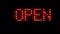 Red scrolling text with the word OPEN 24H