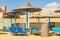 Red Sea Beach with Straw Umbrellas and Deck Chairs - Marsa Alam Egypt Africa