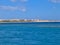 Red sea in Egypt reef, sailboat with blue sails and white yacht