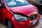 Red Seat Mii mini car severely damaged after traffic accident in crazy Italian driving with deployed airbag and destroyed bonnet