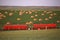 Red seeders and hay bales