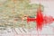 Red seismic wave over London map