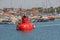 Red Semi-submarine with glass bottom so tourists can see the mar