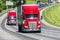 Red Semi Trucks on Highway