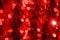 Red sequins pattern. Sparkling sequins background. Red sequin fabric for background. rectangular red shiny fabric