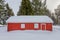 Red Shed Under Deep Snow