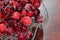 Red shiny cranberries with sugar in a crystal bowl
