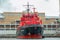 Red ships of the marine rescue service are standing at the mooring wall in the Golden Horn Bay