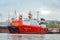 Red ships of the marine rescue service are standing at the mooring wall in the Golden Horn Bay