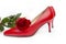 Red shoes heel. Red rose and womens shoes isolated on white background. Feminine composition