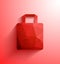 Red shopping bag.Abstract polygonal shape shopping bag with long shadow