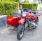 Red sidecar parked. Travel and holiday concept