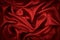 Red silk satin background. Beautiful soft wavy folds on smooth shiny fabric. Anniversary, Christmas,
