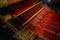 Red silk threads on bobbins of ancient Chinese wooden loom