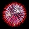 Red and silver fireworks in the form of a sphere