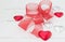 Red and silver foil covered heart Valentine chocolates on white