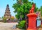 The red Singha Lion and Suwan Chedi Jungkote of Wat Chammathewi, Lamphun, Thailand