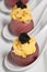 Red skin potato with scrambled eggs and caviar