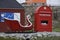 Red sleigh and mailbox, Ilulissat, West Greenland