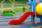 Red slides in the playground