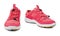 Red sneakers white background isolated close up front side view, pink sport sneaker shoes, pair running gumshoes, fitness boots