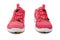 Red sneakers white background isolated closeup front view, pink sport sneaker shoes, pair of running gumshoes, fitness boots