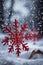 Red snowflake in a snowy environment, xmas background, christmas time