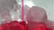 Red soft drink`s bubble in a glass.