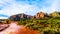 Red Soil and colorful Lee Mountain and other red rock mountains surrounding the town of Sedona in northern Arizona