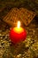 Red, spherical candle and bells