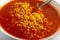 Red Spicy Noodle Soup in White Bowl, Hot Chili Pepper Ramen Closeup