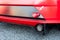 Red sport car bumper and ribbon detail