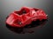 Red Sport Racing Calliper on black reflective background