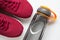 Red sport shoes and bottle of water. Active healthy lifestyle background concept. Fitness and wellness healthy living, dieting