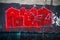 Red spray painted cat house graffiti art