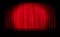 Red stage curtain with spotlight