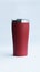 Red stainless steel tumbler and mug vacuum insulated double wall travel cup with lid isolated on white