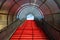 Red staircase with arched roof. Ascending forward to the sky