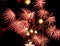 Red star bursts. Spectacular fireworks