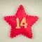 Red star with wooden number 14