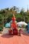 Red statue made of Thao Wessuwan cement, sacred thing at Wat Thai, Nakhon Sawan, Thailand
