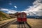 Red steam rack cogwheel train waiting in the Schafbergspitze station on the peak of Schafberg mountain peak in Austrian