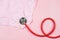 Red Stethoscope on pink underpants on pink background. Woman hygiene, Concept of critical days, menstruation,health care