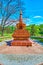 The red stone Chorten Stupa in Tibetan Garden of Kyiv Botanical Garden, Ukraine