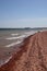 Red stone shoreline on Sakakawea Lake